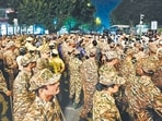 Delhi Police and security forces personnel at the Inner Circle of Connaught Place in New Delhi on Friday. 