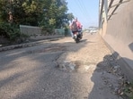 In his representation, Sharma said the road had remained in a state of disrepair despite repeated complaints to the municipal corporation commissioner and officials of its Buildings and Roads (B&R) wing. (HT)