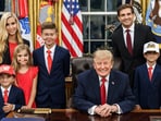 Katie Zacharia shared an Oval Office family photo, thanking Trump for gifts to her children on her son’s birthday.