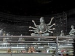 Footwear lies scattered outside a Durga Puja pandal after the exit gate collapsed due to heavy crowd pressure, leading to a stampede-like situation, in Kolkata on Saturday. 