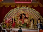 Lucknow came alive with the rhythmic beats of dhaks and the resonant sound of conch shells on Friday as devotees immersed themselves in the festive spirit of Durga Puja on Shashthi, marking the beginning of the city’s vibrant celebrations. (Deepak Gupta/HT)