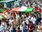 Members of the Cockroach Janata Party (CJP), Krantikari Yuva Sangathan (KYS) and others at a Tiranga March around the inner circle of Connaught Place in New Delhi on Friday. (Hindustan Times)