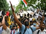 File photo of A Cockroach Janta Party (CJP) supporters shouting slogans at Jantar Mantar in New Delhi on July 23, 2026 during the protest to demand the resignation of India's Education Minister Dharmendra Pradhan over alleged NEET exam irregularities