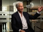 Jamie Dimon predicted AI could reduce workweeks to three or four days while boosting incomes, despite growing security risks.