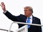 Donald Trump has waived key parts of a Russia sanctions law, drawing criticism from lawmakers and Ukraine’s Zelensky.