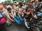 A protester being detained in central Delhi during CJP’s ‘Lehra Do Tiranga’ march on Friday.