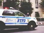 A 34-year-old man was critically injured in a shooting aboard a northbound E train in Manhattan, disrupting subway services.
