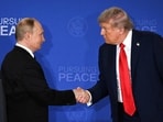 US President Donald Trump and Russian President Vladimir Putin shake hands at the end of a joint press conference after participating in a US-Russia summit on Ukraine at Joint Base Elmendorf-Richardson in Anchorage, Alaska, on August 15, 2025. 