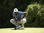 Yuvraj Sandhu sizing up a putt.