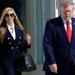President Donald Trump walks out along with White House press secretary Katie Zacharia to talk to reporters before boarding Marine One on the South Lawn of the White House earlier this week. 