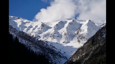 A view of snow-capped mountains following a fresh spell of snowfall near Zojila Pass along the Srinagar-Leh National Highway on Saturday. (PTI) A view of snow-capped mountains following a fresh spell of snowfall near Zojila Pass along the Srinagar-Leh National Highway on Saturday. (PTI)