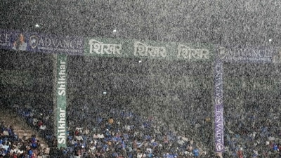 The rain then returned in Bengaluru, as the match was called off after the cut-off time of 10.21 pm passed. (AP Photo/Aijaz Rahi) The rain then returned in Bengaluru, as the match was called off after the cut-off time of 10.21 pm passed. (AP Photo/Aijaz Rahi)
