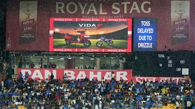In the series decider at the M Chinnaswamy Stadium in Bengaluru, the match was delayed a lot due to rain. The match then began at 9.15 PM with it being reduced to 9-overs-a-side game. (AP Photo/Aijaz Rahi) In the series decider at the M Chinnaswamy Stadium in Bengaluru, the match was delayed a lot due to rain. The match then began at 9.15 PM with it being reduced to 9-overs-a-side game. (AP Photo/Aijaz Rahi)