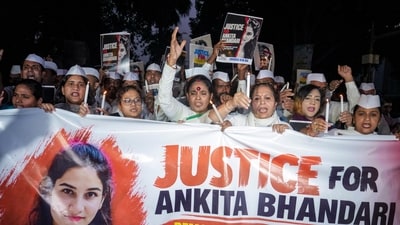 Members and supporters of Congress Seva Dal hold a candle march demanding justice in the Ankita Bhandari murder case. (PTI) Members and supporters of Congress Seva Dal hold a candle march demanding justice in the Ankita Bhandari murder case. (PTI)