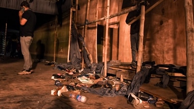 Footwear lies scattered outside a Durga Puja pandal after the exit gate collapsed due to heavy crowd pressure, leading to a stampede-like situation, in Kolkata, Saturday, Oct. 17, 2026. (PTI)