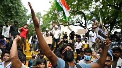 File photo of A Cockroach Janta Party (CJP) supporters shouting slogans at Jantar Mantar in New Delhi on July 23, 2026 during the protest to demand the resignation of India's Education Minister Dharmendra Pradhan over alleged NEET exam irregularities (AFP) File photo of A Cockroach Janta Party (CJP) supporters shouting slogans at Jantar Mantar in New Delhi on July 23, 2026 during the protest to demand the resignation of India's Education Minister Dharmendra Pradhan over alleged NEET exam irregularities (AFP)