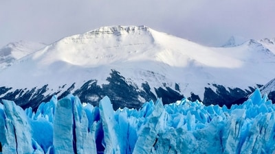 Thwaites Glacier in West Antarctica, known as the “Doomsday Glacier,” is melting faster than earlier projections, a new study says. (Unsplash/ representative image) Thwaites Glacier in West Antarctica, known as the “Doomsday Glacier,” is melting faster than earlier projections, a new study says. (Unsplash/ representative image)