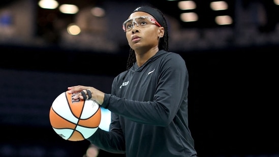 Allisha Gray was spotted warming up before tipoff and adjusting the tape on her fingers.