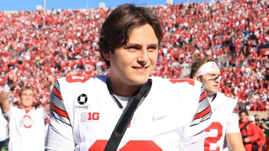 Julian Sayin walks off the field with his arm in a sling after defeating the Indiana Hoosiers.