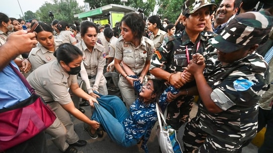 A protester being detained in central Delhi during CJP’s ‘Lehra Do Tiranga’ march on Friday.