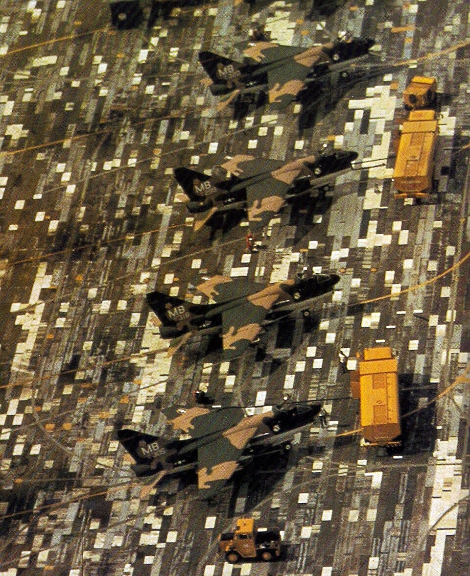 US fighter planes merge with a disruptively patterned airfield at Korat Royal Thai Air Force Base, in 1972. (Wikimedia) US fighter planes merge with a disruptively patterned airfield at Korat Royal Thai Air Force Base, in 1972. (Wikimedia)