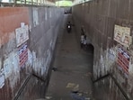 A view of a neglected subway on NH-48 near Anaj Mandi, marred by poor lighting, garbage and foul smells. (HT Photo)
