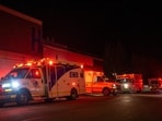 Emergency crews and military personnel gather at the Wainwright Health Centre as injured military members are treated after a fire at Canadian Forces Base Wainwright, outside of Wainwright, Alberta Saturday, Oct. 17, 2026. 