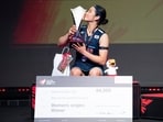 Winner An Se Young of South Korea celebrates winning the women's singles final at the Denmark Badminton Open in Odense, Sunday, Oct. 18