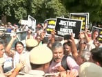 Protesters outside Patiala House court seeking justice in Ankita Bhandari murder case.
