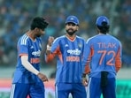 From left, India's Mayank Yadav, captain Shreyas Iyer and Tilak Varma during the fourth T20I cricket match of a series between India and West Indies, in Hyderabad