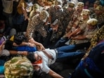 Protesters being removed by the police during 'Lehra Do Tiranga' protest called by the Cockroach Janta Party (CJP) demanding the resignation of Chief Election Commissioner (CEC) Gyanesh Kumar. (Photo for representation)(PTI)