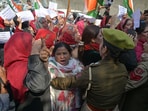 Police trying to stop the Congress workers during their protest in Srinagar on Saturday. (Waseem Andrabi/HT)