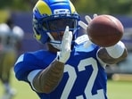 Los Angeles Rams cornerback Trent McDuffie catches the ball against the New Orleans Saints during a joint practice.
