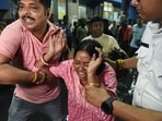 A woman breaks down at Kolkata Medical College, where those injured in the stampede at the Chorbagan Sarbojanin Durga Puja pandal have been brought for treatment, in Kolkata on Saturday.

