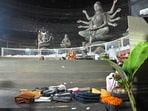 Purses and other belongings left behind by devotees lie on the floor of the Durga Puja pandal on Sunday.