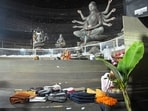Purses and other belongings left behind by devotees lie on the floor of the pandal in Kolkata on Saturday.