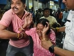 A woman breaks down at Kolkata Medical College, where those injured in the stampede at the Chorbagan Sarbojanin Durga Puja pandal have been brought for treatment, in Kolkata on Saturday.