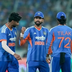 From left, India's Mayank Yadav, captain Shreyas Iyer and Tilak Varma during the fourth T20I cricket match of a series between India and West Indies, in Hyderabad