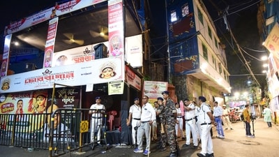 Kolkata Police at the site after a stampede at the Chorbagan Sarbojanin Durga Puja pandal, in Kolkata, West Bengal. (ANI) Kolkata Police at the site after a stampede at the Chorbagan Sarbojanin Durga Puja pandal, in Kolkata, West Bengal. (ANI)