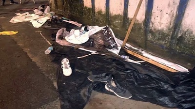Kolkata, Oct 18 (ANI): A view of people's shoes at the site of the Chorbagan Durga Puja pandal stampede, in Kolkata on Saturday. Nineteen people died. (ANI Video Grab) (ANI Video Grab) Kolkata, Oct 18 (ANI): A view of people's shoes at the site of the Chorbagan Durga Puja pandal stampede, in Kolkata on Saturday. Nineteen people died. (ANI Video Grab) (ANI Video Grab)