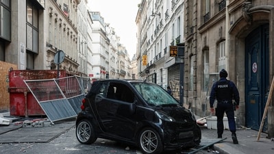France on Sunday woke up to devastated streets after clashes between police and protesters amid marches against rising costs of living (Reuters)