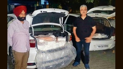 Officials of the heath department with the seized paneer in Ludhiana on Sunday. (HT Photo) Officials of the heath department with the seized paneer in Ludhiana on Sunday. (HT Photo)