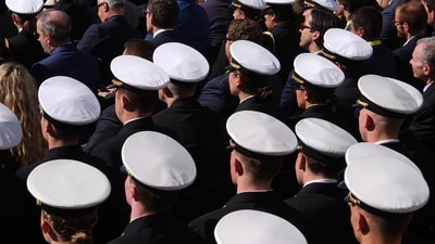 Naval Academy midshipmen arrive before President Donald Trump speaks at an event for Anduril Industries, Inc., at Sparrows Point Shipyard, Tuesday, Oct. 6. (AP Photo/Julia Demaree Nikhinson) Naval Academy midshipmen arrive before President Donald Trump speaks at an event for Anduril Industries, Inc., at Sparrows Point Shipyard, Tuesday, Oct. 6. (AP Photo/Julia Demaree Nikhinson)