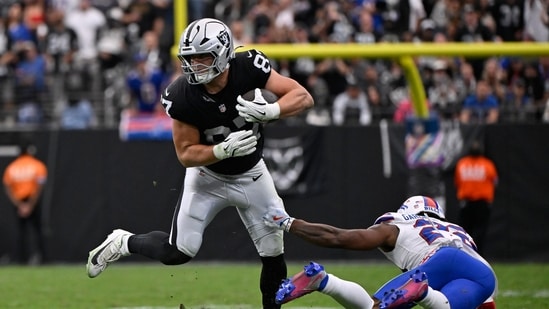 Las Vegas Raiders tight end Michael Mayer makes a catch in front of Buffalo Bills safety C.J. Gardner-Johnson. (AP Photo/David Becker)