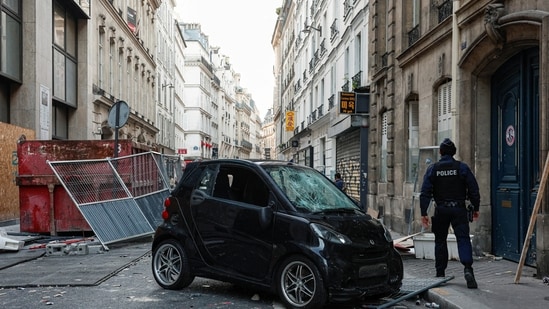 France on Sunday woke up to devastated streets after clashes between police and protesters amid marches against rising costs of living