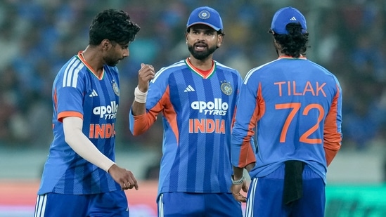 From left, India's Mayank Yadav, captain Shreyas Iyer and Tilak Varma during the fourth T20I cricket match of a series between India and West Indies, in Hyderabad