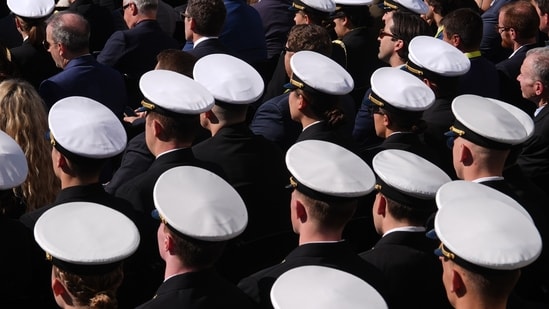 Naval Academy midshipmen arrive before President Donald Trump speaks at an event for Anduril Industries, Inc., at Sparrows Point Shipyard, Tuesday, Oct. 6.