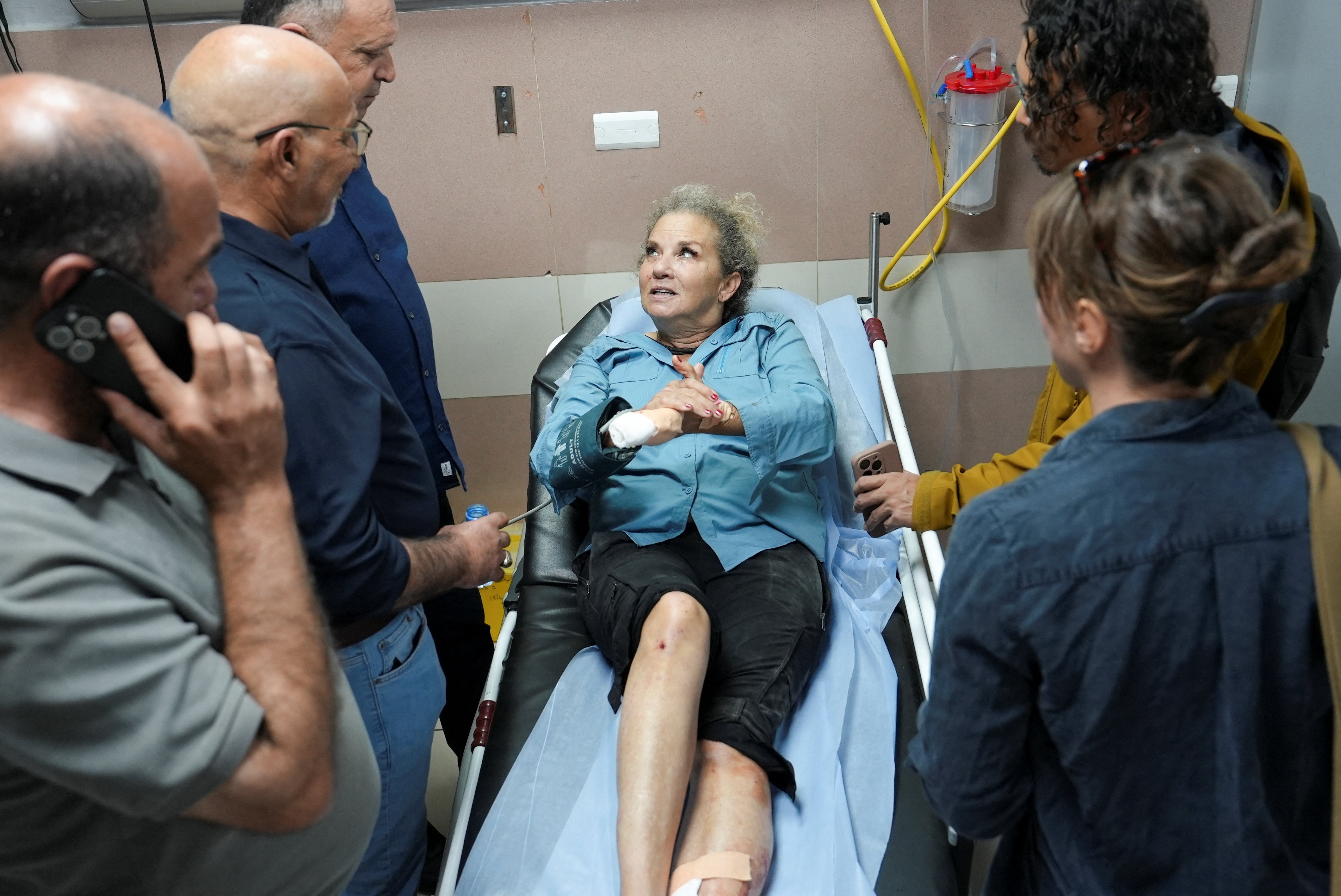 Heidi Levine, a photojournalist with the Washington Post, speaks to journalists at the hospital after sustaining multiple injuries during an attack by Israeli militant settlers on Palestinians harvesting olives, in Ramallah. (REUTERS)