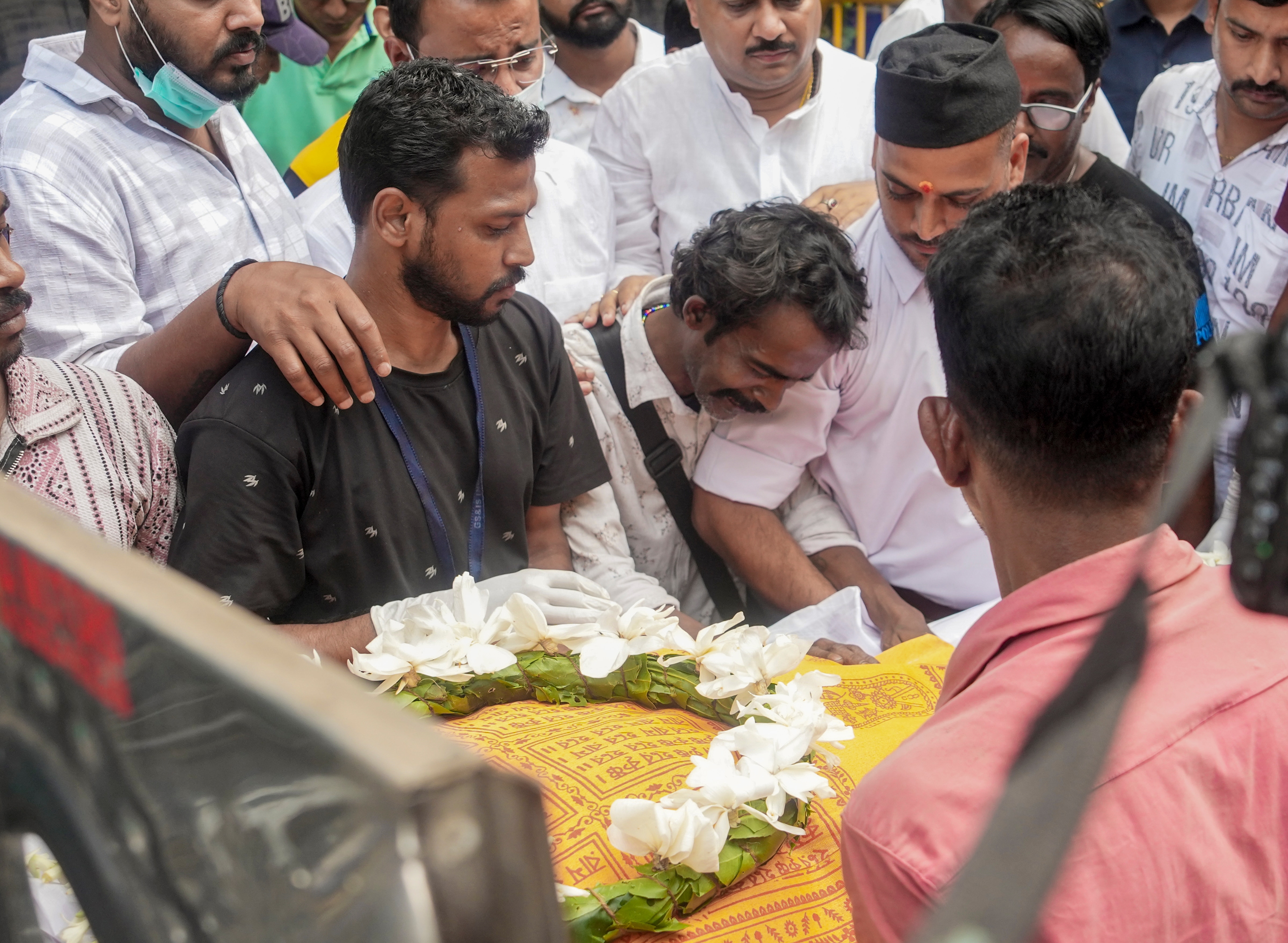 Family members and relatives mourn during the death of the victims of the stampede. (PTI) Family members and relatives mourn during the death of the victims of the stampede. (PTI)