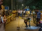 iMumbai, India - October  18, 2026:  Forensic Experts and Police collect samples of evidence from the spot where unidentified assailants fired at Tiger Shroff, near Pushpa Narsee park, Vile Parle west in mumbai, India, on Sunday, October 18, 2026.  (Photo by / Hindustan Times)